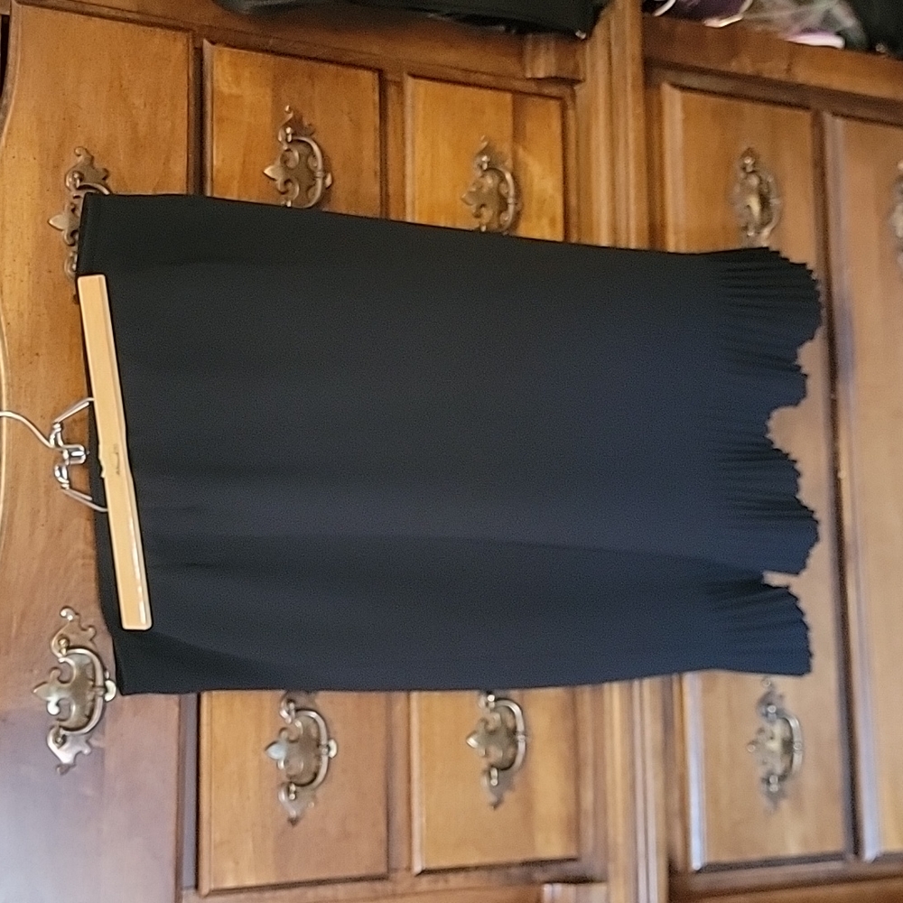 Black pencil skirt with cute flair by knee